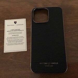 A spinal of London Black Leather Embossed 
i Phone Case 14 Max Pro Preowned